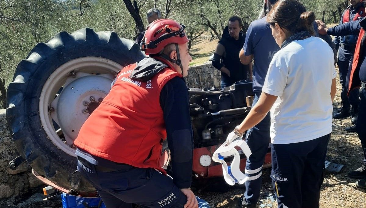 balikesirde traktor devrildi surucu yaralandi MWmAOhsD